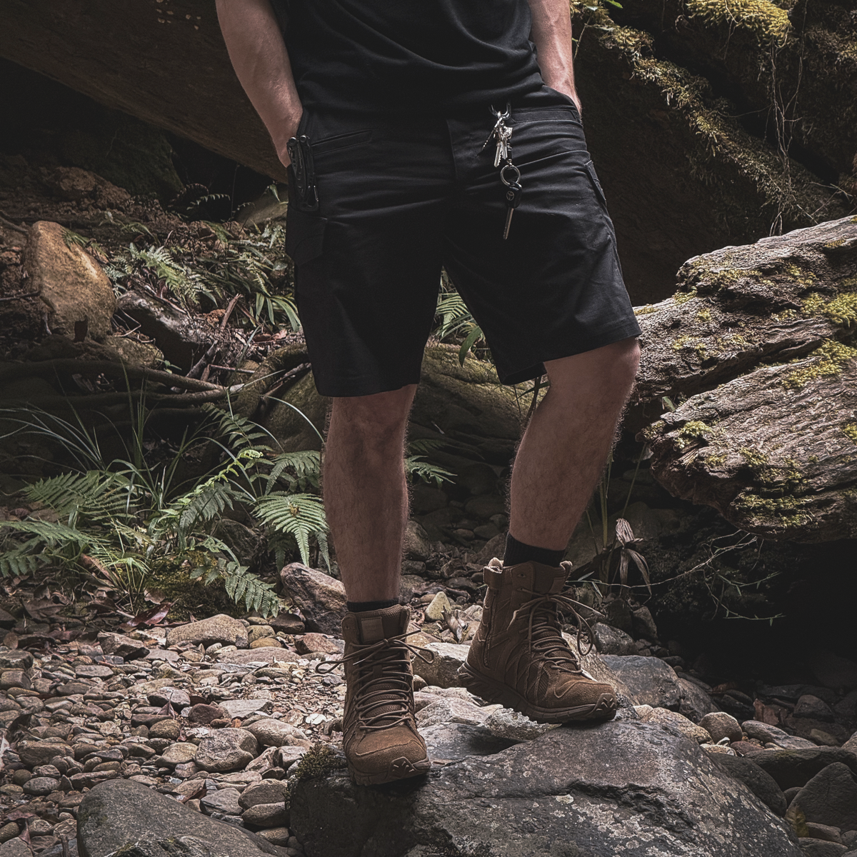 Person wearing Reebok Trailgrip Tactical 8 side zip boot