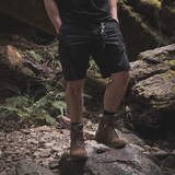 Person wearing Reebok Trailgrip Tactical 8 side zip boot